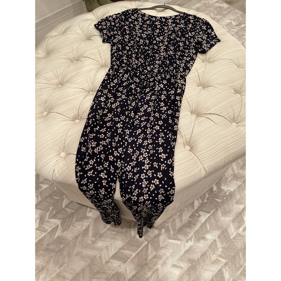 Short Sleeve Floral Jumpsuit with Tapered Legs and Elasticized Waist. - Picture 9 of 10